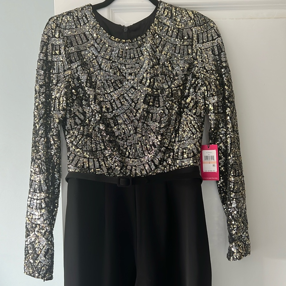 Never worn beautiful jumpsuit with gold and silver sequins
